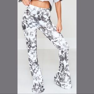 PRETTYLITTLETHING Black Flared Tie Dye Pants